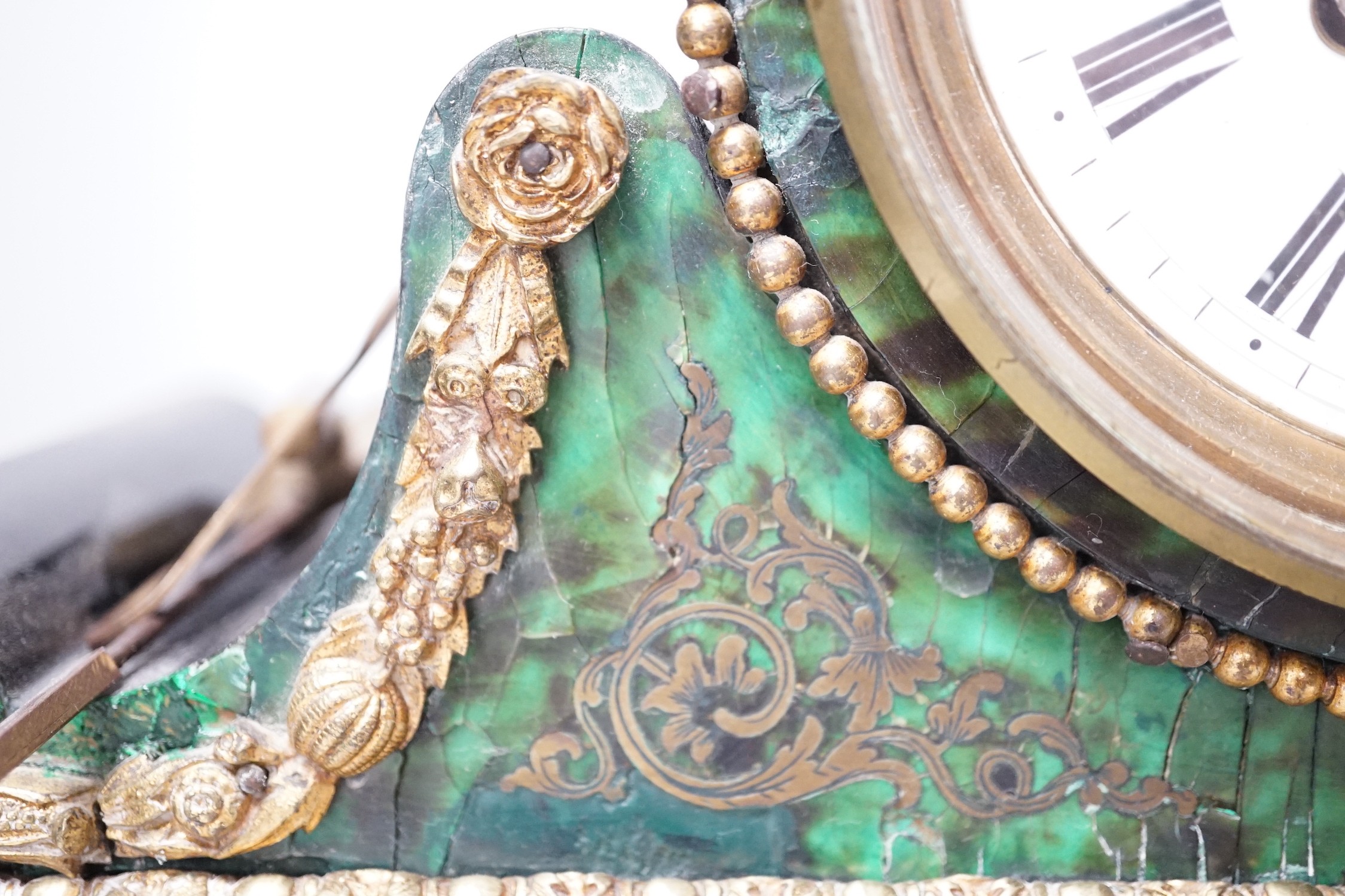 A 19th century French green Boulle work mantel clock. 41cm wide